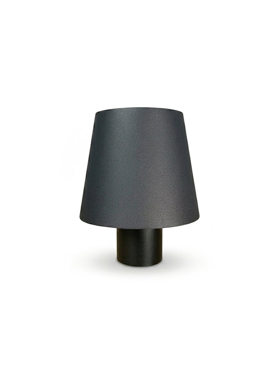 Vinlume Classic Cylinder Bottle Lamp in dark grey with a conical shade and cylindrical base. Cordless and rechargeable.