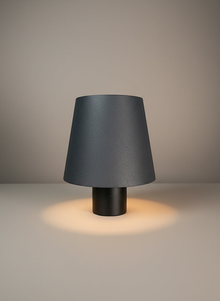 Vinlume Classic Cylinder Bottle Lamp in dark grey with a warm ambient light glow.