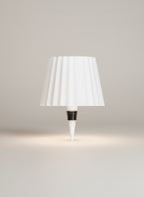Vinlume white pleated bottle lamp with textured finish and adjustable light settings.