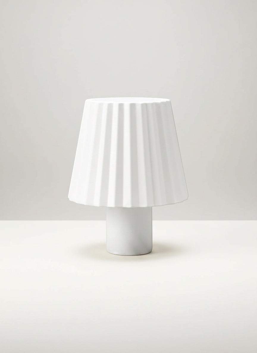 Vinlume white textured cylinder bottle lamp with pleated shade, ideal for ambient lighting.